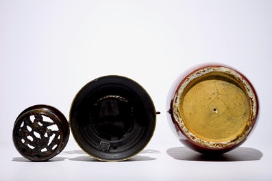 A Chinese monochrome oxblood vase and a bronze incense burner, 19th C.