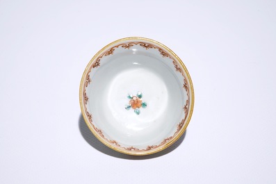 Nine Chinese famille rose on capucin brown ground cups and saucers, Qianlong
