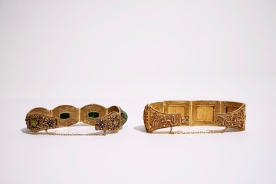 Un ensemble de bijoux en argent dor&eacute; et &eacute;maill&eacute;, ivoire peint et malachite, d&eacute;but du 20&egrave;me