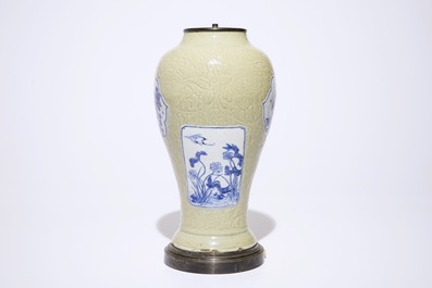 A Chinese blue and white on carved celadon-glazed ground vase, mounted as lamp, Kangxi