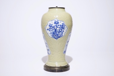 A Chinese blue and white on carved celadon-glazed ground vase, mounted as lamp, Kangxi
