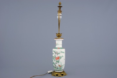 A Chinese green ground dragon vase, a small rouleau vase and a verte biscuit figure, 19th C.