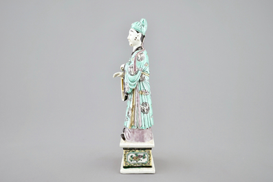 A Chinese green ground dragon vase, a small rouleau vase and a verte biscuit figure, 19th C.