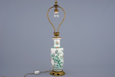 A Chinese green ground dragon vase, a small rouleau vase and a verte biscuit figure, 19th C.