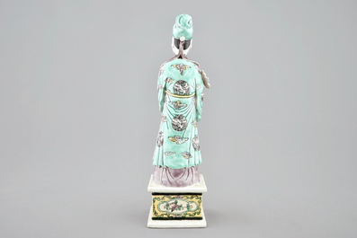 A Chinese green ground dragon vase, a small rouleau vase and a verte biscuit figure, 19th C.
