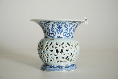 A rare blue, white and lavender-glazed reticulated revolving zhadou spittoon, Qianlong mark, 19/20th C.