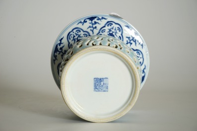 A rare blue, white and lavender-glazed reticulated revolving zhadou spittoon, Qianlong mark, 19/20th C.
