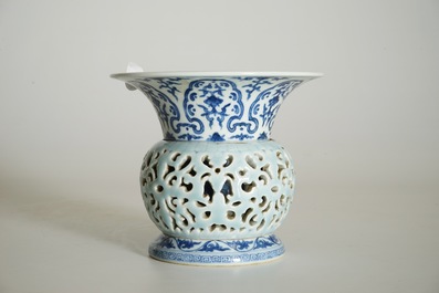 A rare blue, white and lavender-glazed reticulated revolving zhadou spittoon, Qianlong mark, 19/20th C.