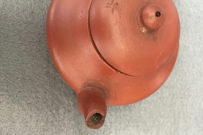Two Chinese Yixing teapots and covers, 19th C.