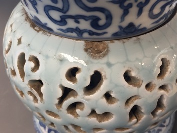 A rare blue, white and lavender-glazed reticulated revolving zhadou spittoon, Qianlong mark, 19/20th C.