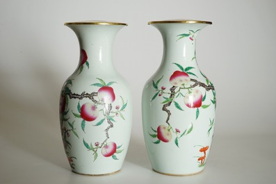 A pair of Chinese famille rose "nine peaches" vases, 19th C.