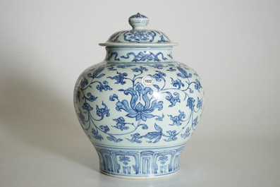 A Chinese blue and white peony scroll vase and cover, Ming, Wanli