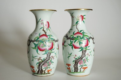 A pair of Chinese famille rose "nine peaches" vases, 19th C.