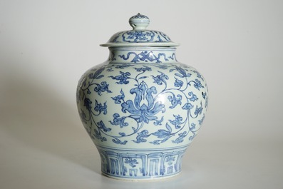A Chinese blue and white peony scroll vase and cover, Ming, Wanli
