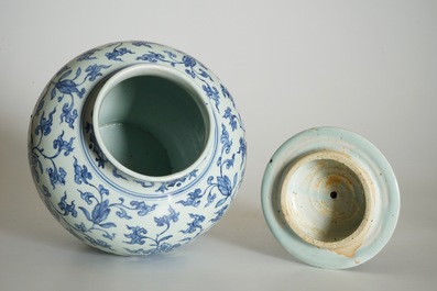 A Chinese blue and white peony scroll vase and cover, Ming, Wanli
