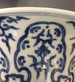 A rare blue, white and lavender-glazed reticulated revolving zhadou spittoon, Qianlong mark, 19/20th C.