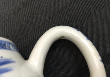 A Chinese blue and white "buffalo riding" teapot, Yongzheng