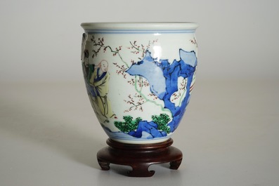 A Chinese wucai brush pot on wooden stand, Transitional period