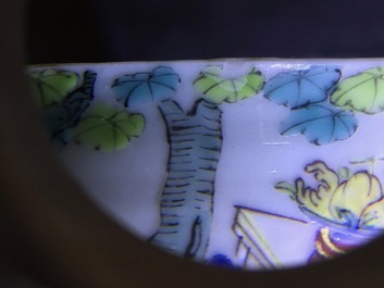 A fine Chinese famille rose eggshell cup and saucer with a lady and two boys, Yongzheng