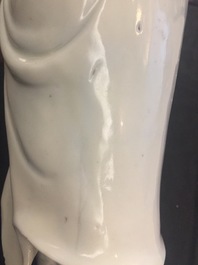A Chinese Dehua blanc de Chine model of a standing Buddha, impressed mark on the back, Kangxi