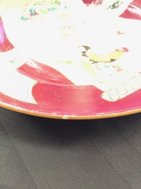 A pair of Chinese famille rose ruby ground rooster plates, Yongzheng