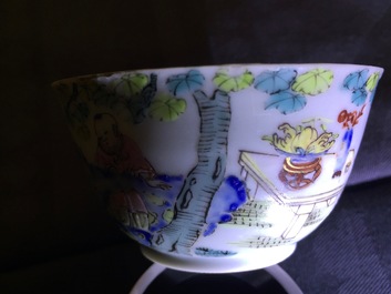 A fine Chinese famille rose eggshell cup and saucer with a lady and two boys, Yongzheng