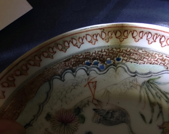 A Chinese famille rose cup and saucer with two egrets, Yongzheng