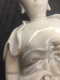 A Chinese Dehua blanc de Chine model of a standing Buddha, impressed mark on the back, Kangxi