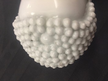 A Chinese Dehua blanc de Chine model of a standing Buddha, impressed mark on the back, Kangxi