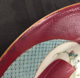 A pair of Chinese famille rose ruby ground rooster plates, Yongzheng