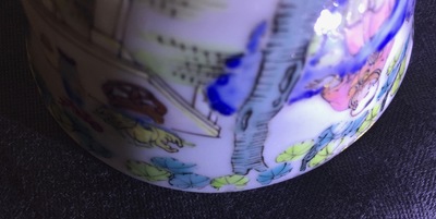 A fine Chinese famille rose eggshell cup and saucer with a lady and two boys, Yongzheng