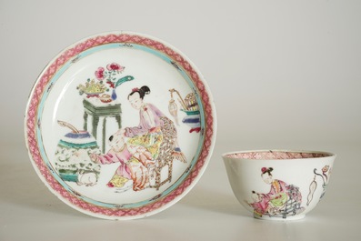 A Chinese famille rose cup and saucer with a lady and a boy, Yongzheng