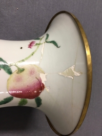 A pair of Chinese famille rose "nine peaches" vases, 19th C.