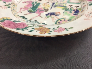 A Chinese famille rose plate with figures in a garden, Yongzheng