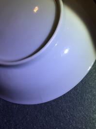 A pair of Chinese famille rose cups and saucers, Yongzheng/Qianlong