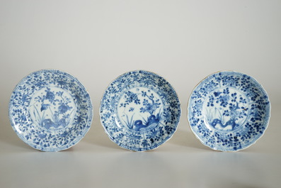 Six Chinese blue and white on capucin brown ground cups and saucers, Kangxi
