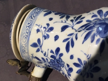 A twisted Chinese blue and white metal-mounted covered jug, Kangxi