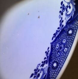 A large Chinese blue and white bowl with birds among blossoming flowers, Qianlong