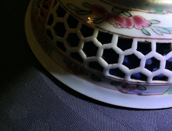 A Chinese double-walled famille rose cup and saucer, Yongzheng/Qianlong
