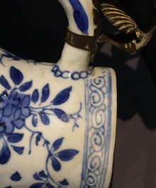 A twisted Chinese blue and white metal-mounted covered jug, Kangxi
