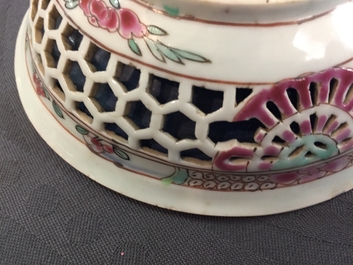 A Chinese double-walled famille rose cup and saucer, Yongzheng/Qianlong