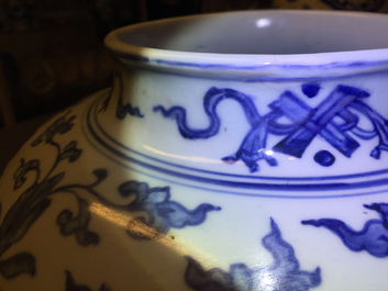 A Chinese blue and white peony scroll vase and cover, Ming, Wanli