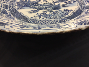 A massive Chinese blue and white kraak porcelain dish with a lion, Ming, Wanli