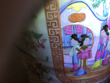 A pair of Chinese Canton famille rose on celadon ground vases, 19th C.