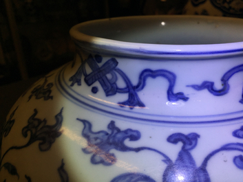 A Chinese blue and white peony scroll vase and cover, Ming, Wanli