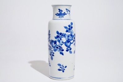 A Chinese blue and white rouleau vase with floral design, Kangxi
