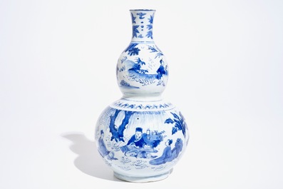 A Chinese blue and white double gourd vase, Transitional period