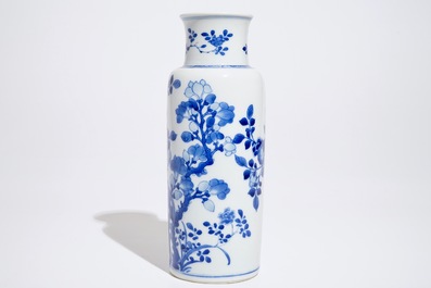 A Chinese blue and white rouleau vase with floral design, Kangxi