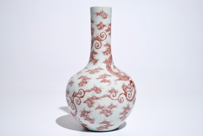 A Chinese underglaze red bottle-shaped dragon vase, 19/20th C.