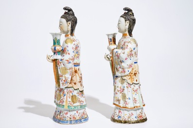 Two large Chinese famille rose candle holders modelled as court ladies, Qianlong